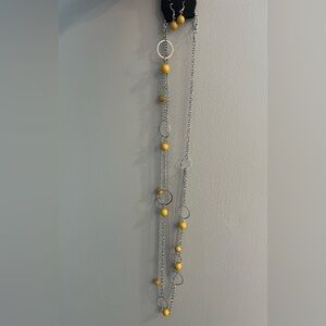 Silver necklace with matching earrings yellow